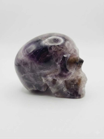 Crâne en Quartz Fumé & Inclusions d’Améthyste